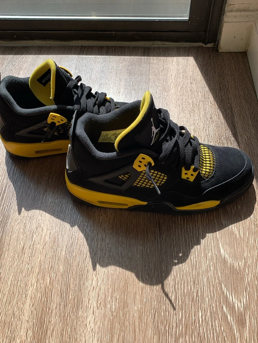 ‘Thunder’ Jordan 4’s